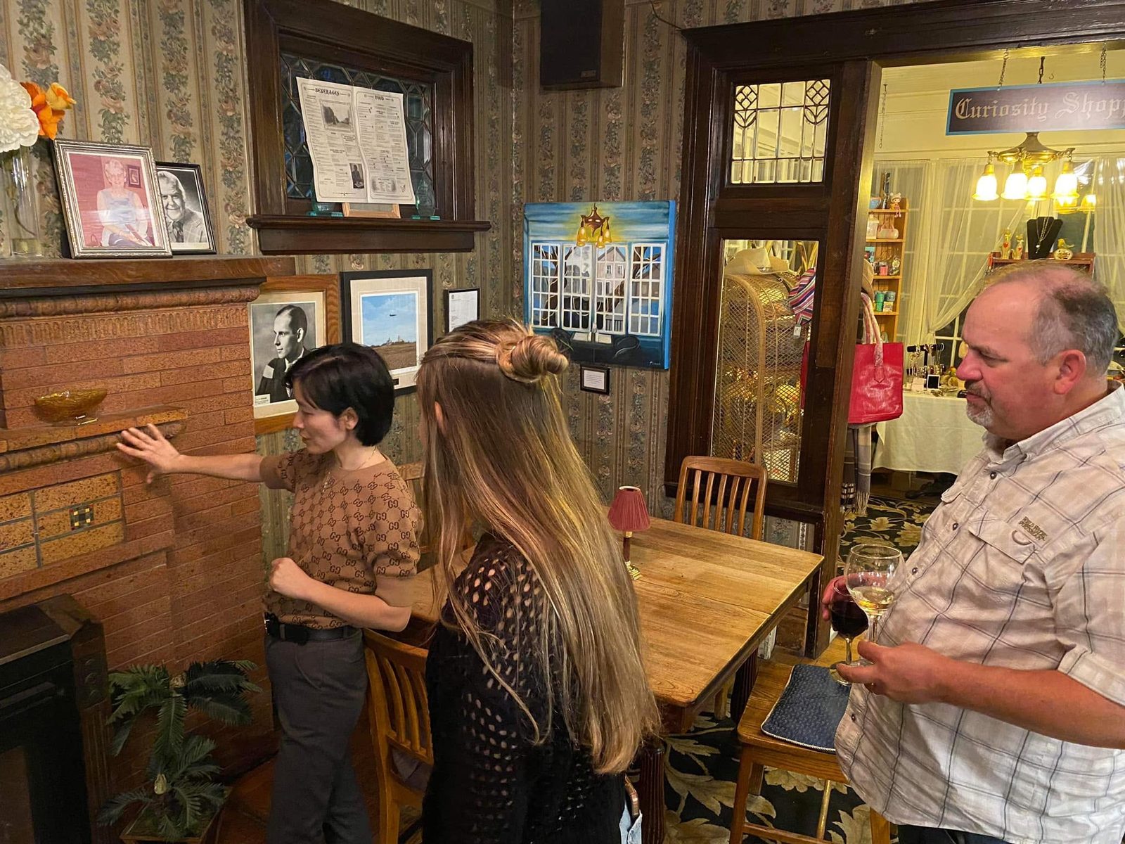 Linda leading guests on a tour of the house